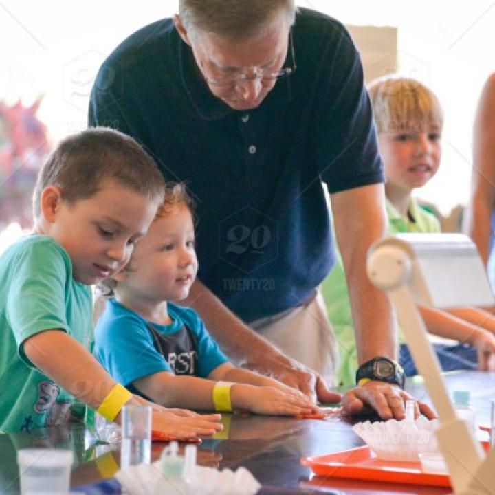 stock-photo-education-learning-school-science-children-classroom-chemistry-science-experiment-happy-children-079cc4bf-c566-4b36-a192-c97ecc71b06c